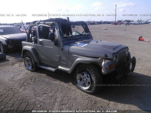 1J4FA59S04P714954 - 2004 JEEP WRANGLER / TJ SAHARA BROWN photo 1