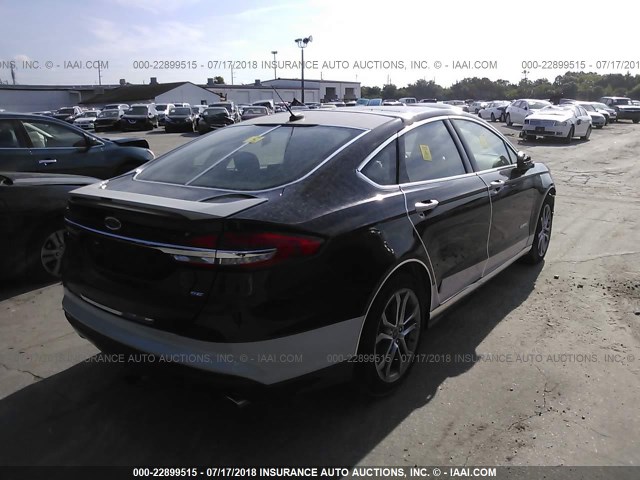 3FA6P0LU0HR190856 - 2017 FORD FUSION SE HYBRID BLACK photo 4