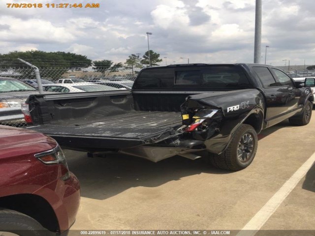 1N6AA1E57HN566146 - 2017 NISSAN TITAN SV/SL/PRO-4X/PLAT RES BLACK photo 14