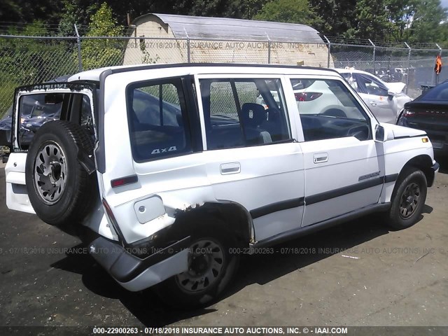 JS3TD03VXV4101332 - 1997 SUZUKI SIDEKICK JX WHITE photo 4