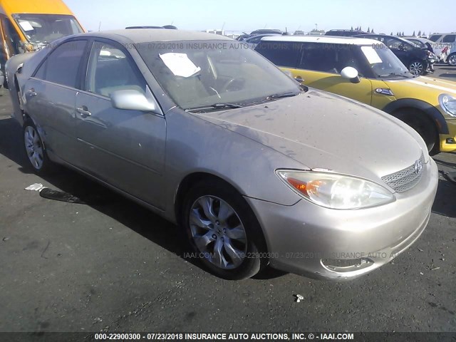 JTDBE32K140273688 - 2004 TOYOTA CAMRY LE/XLE GOLD photo 1