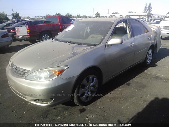 JTDBE32K140273688 - 2004 TOYOTA CAMRY LE/XLE GOLD photo 2