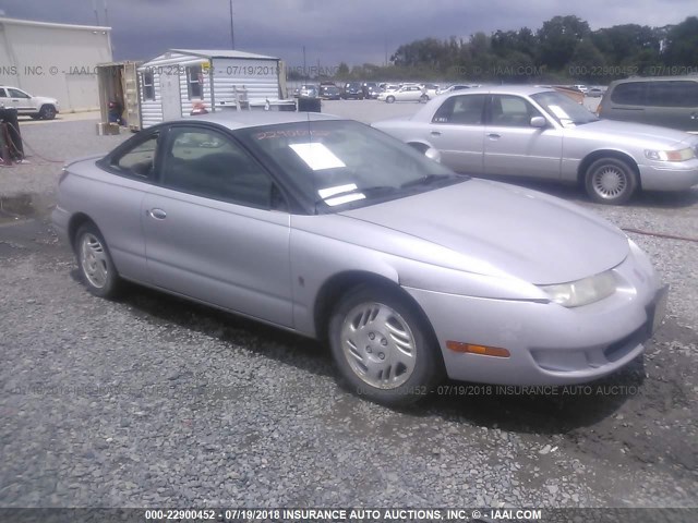 1G8ZR1279YZ105375 - 2000 SATURN SC2 SILVER photo 1