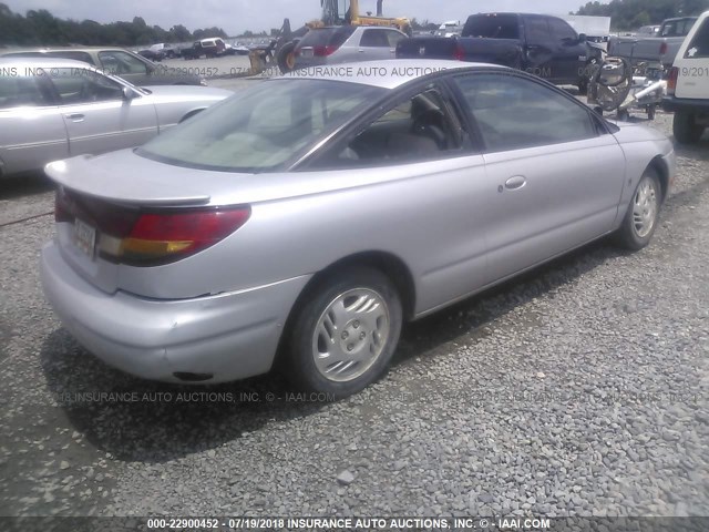 1G8ZR1279YZ105375 - 2000 SATURN SC2 SILVER photo 4