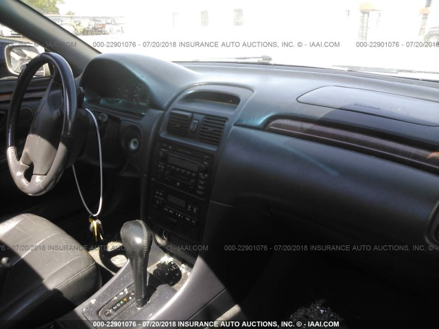 2T1CF28P21C539509 - 2001 TOYOTA CAMRY SOLARA SE/SLE Gümüş foto 5