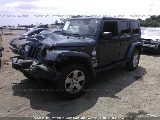 1J4GA59158L537214 - 2008 JEEP WRANGLER UNLIMITE SAHARA BLUE photo 2