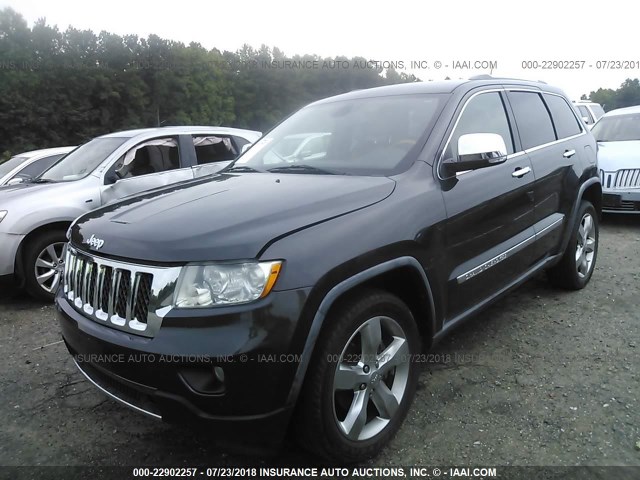 1J4RS6GG2BC611425 - 2011 JEEP GRAND CHEROKEE OVERLAND BLACK photo 2