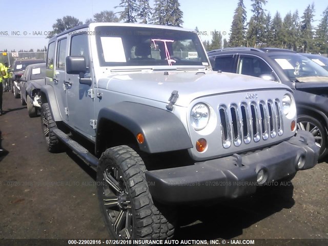 1J4BA3H14BL521416 - 2011 JEEP WRANGLER UNLIMITE SPORT SILVER photo 1