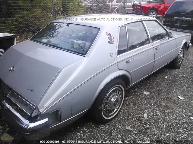 1G6KS6987FE825577 - 1985 CADILLAC SEVILLE SILVER photo 4