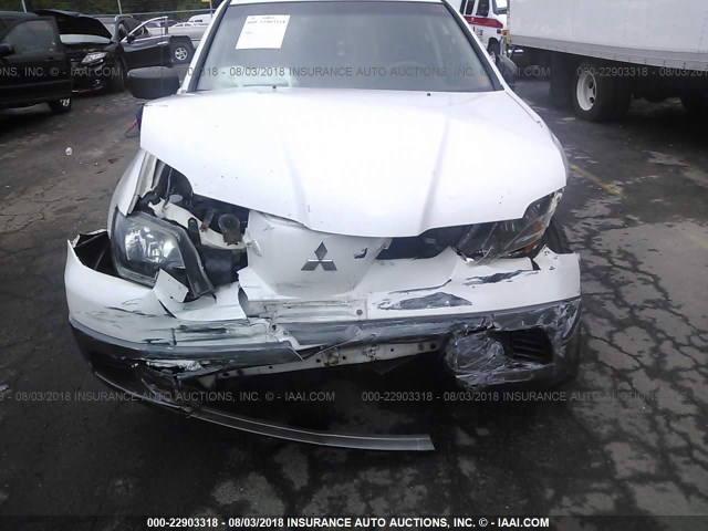 JA4LZ31F74U000240 - 2004 MITSUBISHI OUTLANDER LS WHITE photo 6