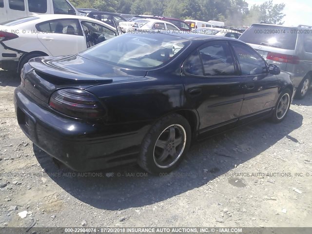 1G2WR5213YF297703 - 2000 PONTIAC GRAND PRIX GTP BLACK photo 4