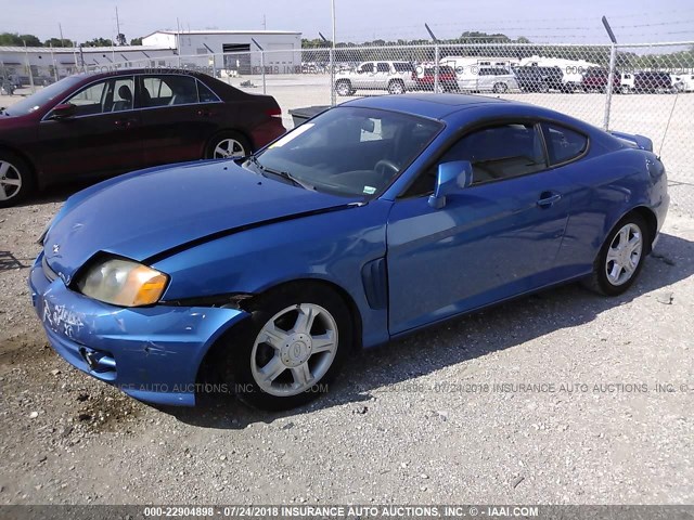 KMHHM65DX4U126611 - 2004 HYUNDAI TIBURON BLUE photo 2