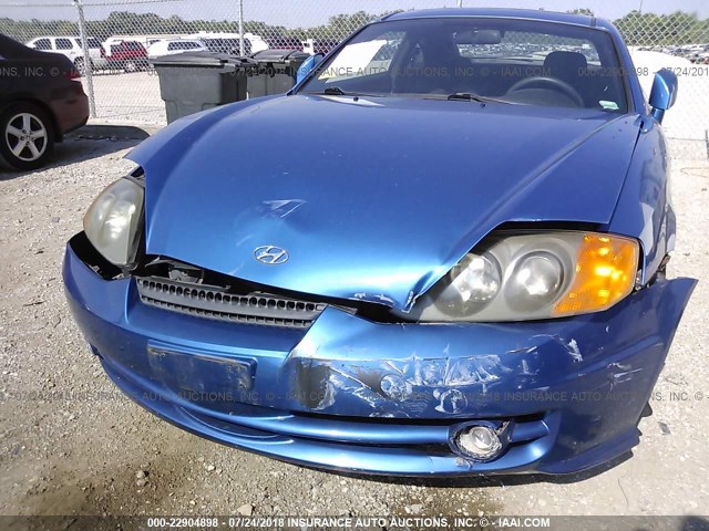 KMHHM65DX4U126611 - 2004 HYUNDAI TIBURON BLUE photo 6