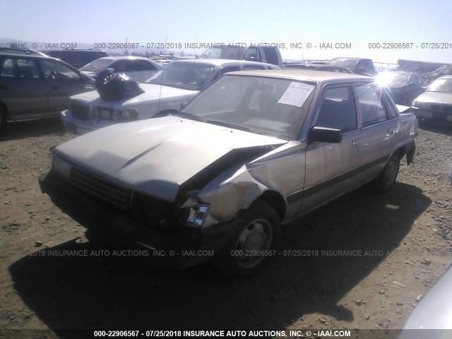 JT2SV12E7F0256825 - 1985 TOYOTA CAMRY DLX SILVER photo 2