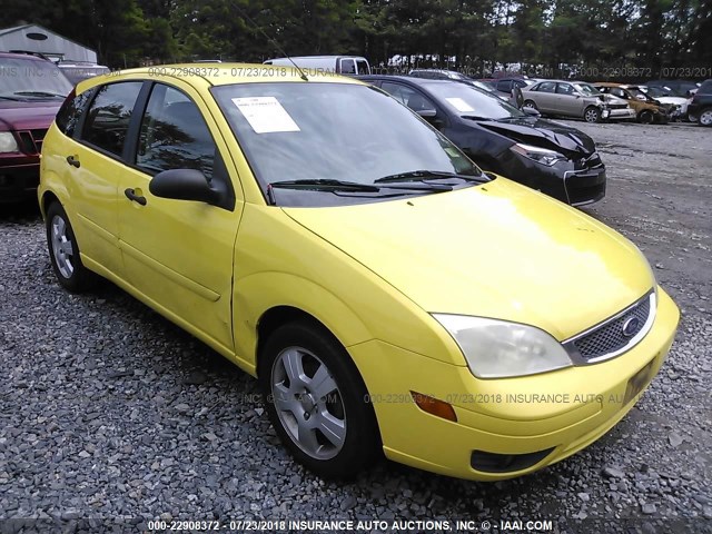 3FAFP37N85R145311 - 2005 FORD FOCUS ZX5 YELLOW photo 1