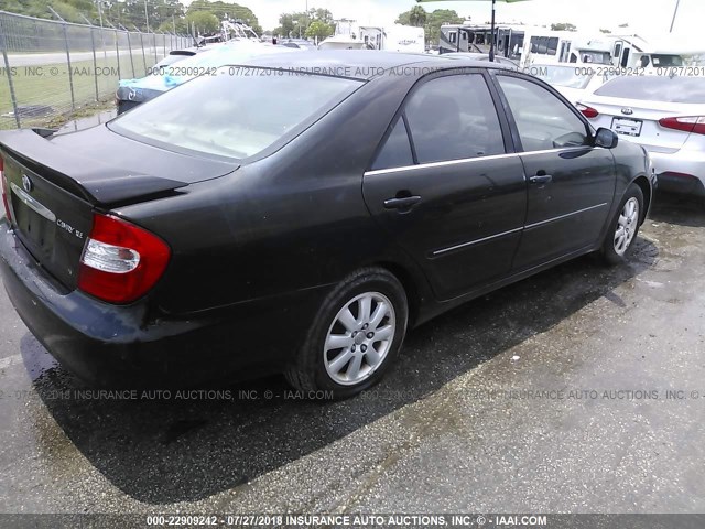 JTDBF30KX20035111 - 2002 TOYOTA CAMRY LE/XLE/SE Qara foto 4