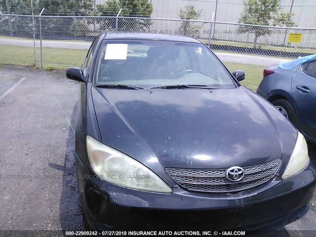 JTDBF30KX20035111 - 2002 TOYOTA CAMRY LE/XLE/SE Qara foto 6