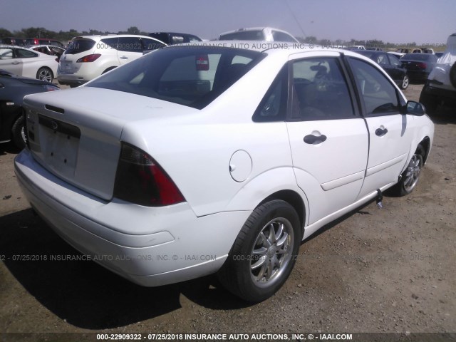 1FAFP34N27W123230 - 2007 FORD FOCUS ZX4/S/SE/SES WHITE photo 4