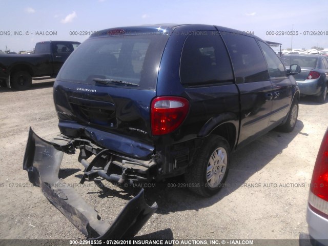 1B4GP45312B572185 - 2002 DODGE CARAVAN SPORT BLUE photo 4