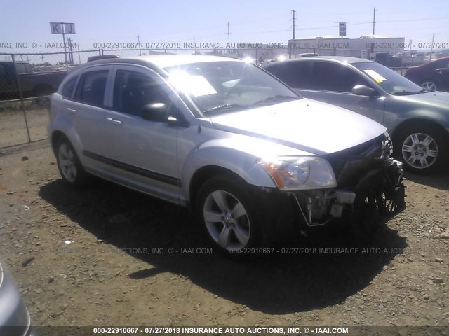 1B3CB3HA8BD108028 - 2011 DODGE CALIBER MAINSTREET SILVER photo 1