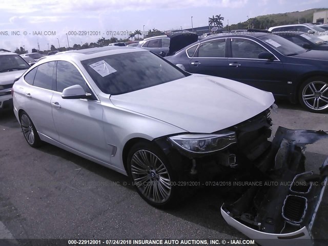 WBA3X9C58ED152786 - 2014 BMW 335 XIGT WHITE photo 1