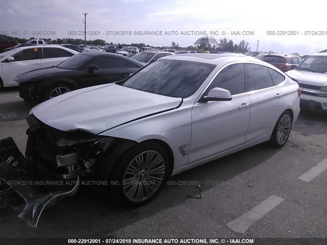 WBA3X9C58ED152786 - 2014 BMW 335 XIGT WHITE photo 2