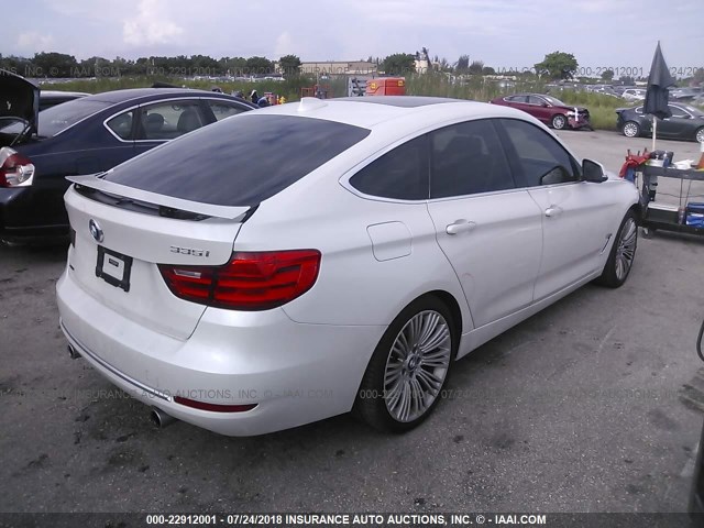 WBA3X9C58ED152786 - 2014 BMW 335 XIGT WHITE photo 4