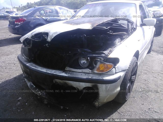 WBAEW53403PN31529 - 2003 BMW 330 XI WHITE photo 6