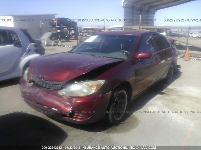 JTDBE32K240280262 - 2004 TOYOTA CAMRY LE/XLE RED photo 2