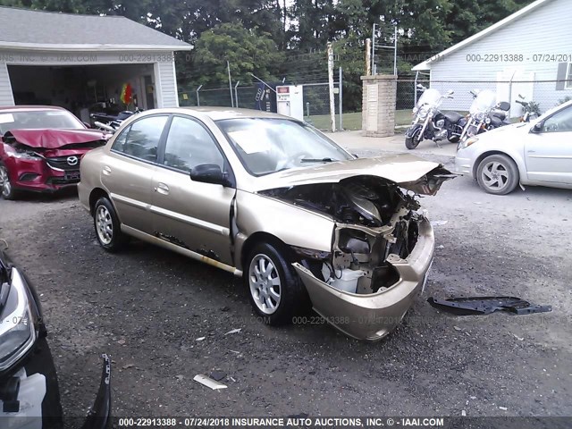 KNADC125846301025 - 2004 KIA RIO GOLD photo 1