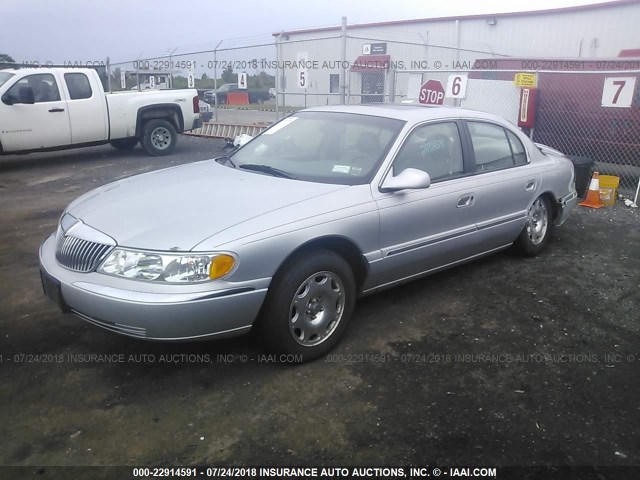 1LNHM97V2XY644085 - 1999 LINCOLN CONTINENTAL  Srebrny zdjęcie 2