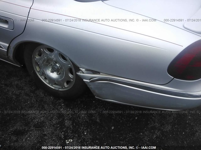 1LNHM97V2XY644085 - 1999 LINCOLN CONTINENTAL  Srebrny zdjęcie 6