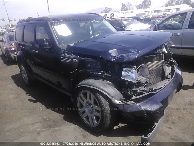 1D4PT4GK4BW574401 - 2011 DODGE NITRO HEAT BLACK photo 1