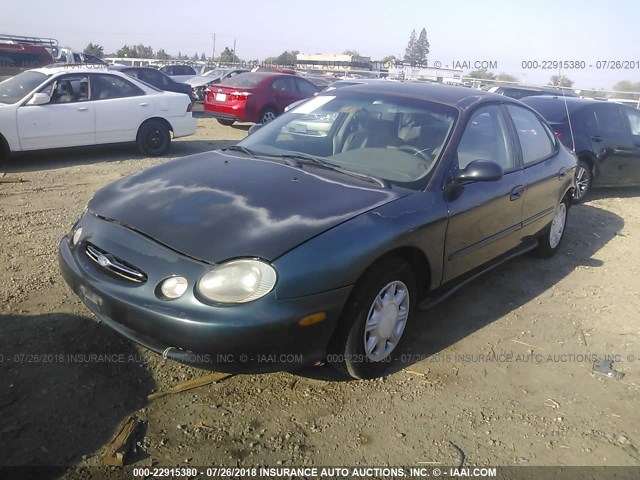 1FAFP52U8WG195483 - 1998 FORD TAURUS LX/SE GREEN photo 2