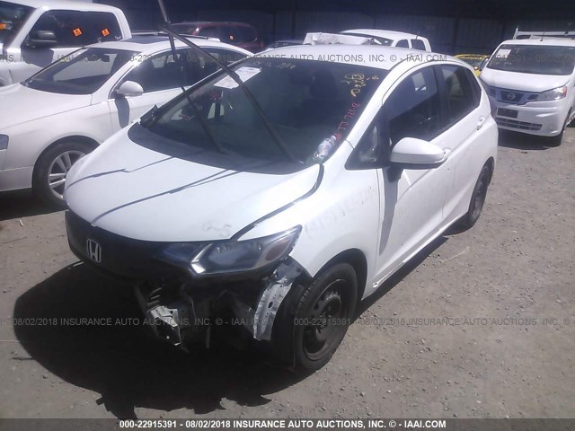 JHMGK5H5XGX006927 - 2016 HONDA FIT LX WHITE photo 2