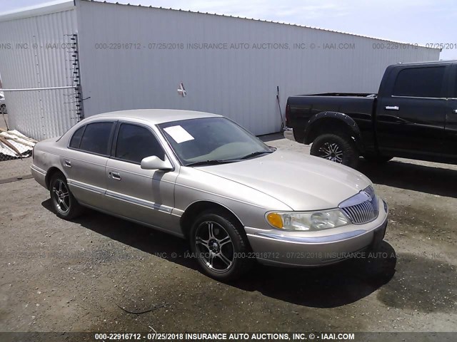 1LNFM97V4WY633899 - 1998 LINCOLN CONTINENTAL  TAN photo 1