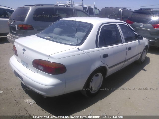 1Y1SK52802Z413744 - 2002 CHEVROLET GEO PRIZM LSI WHITE photo 4