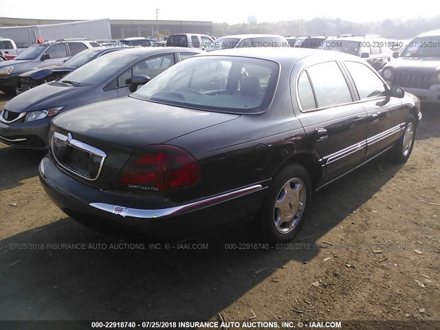 1LNHM97V11Y730141 - 2001 LINCOLN CONTINENTAL  BLACK photo 4