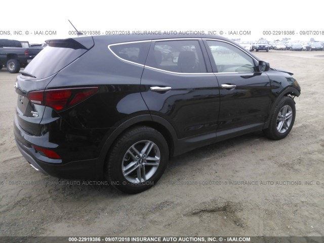 5NMZTDLB0JH090495 - 2018 HYUNDAI SANTA FE SPORT  BLACK photo 4