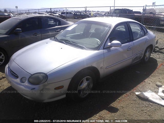 1FAFP53S5XG134994 - 1999 FORD TAURUS SE/COMFORT/SPORT SILVER photo 2