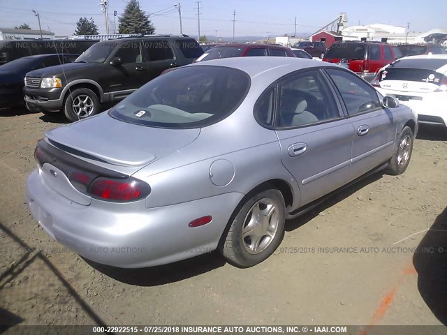 1FAFP53S5XG134994 - 1999 FORD TAURUS SE/COMFORT/SPORT SILVER photo 4