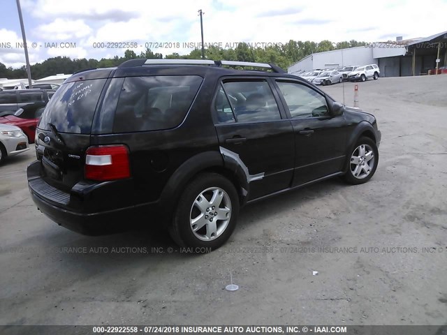 1FMDK06145GA34853 - 2005 FORD FREESTYLE LIMITED BLACK photo 4