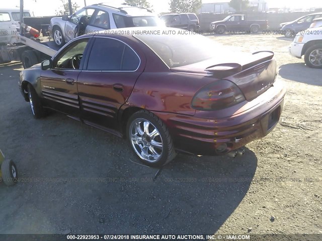 1G2NF52E1YM844633 - 2000 PONTIAC GRAND AM SE1 RED photo 3