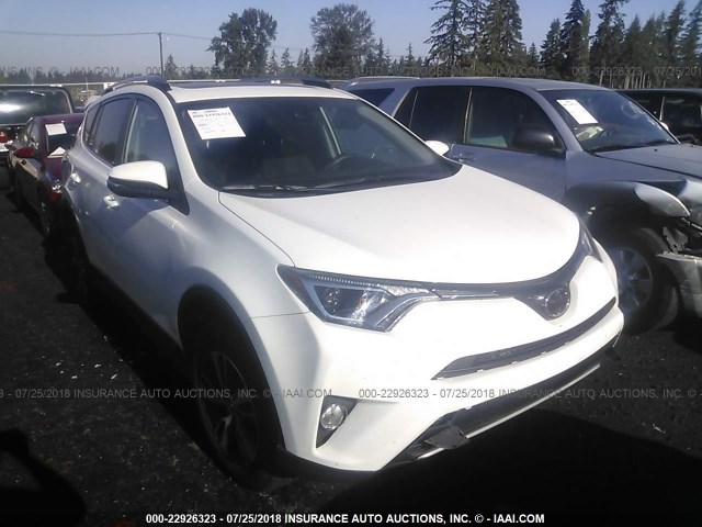 2T3RFREV0JW743835 - 2018 TOYOTA RAV4 ADVENTURE/XLE WHITE photo 1