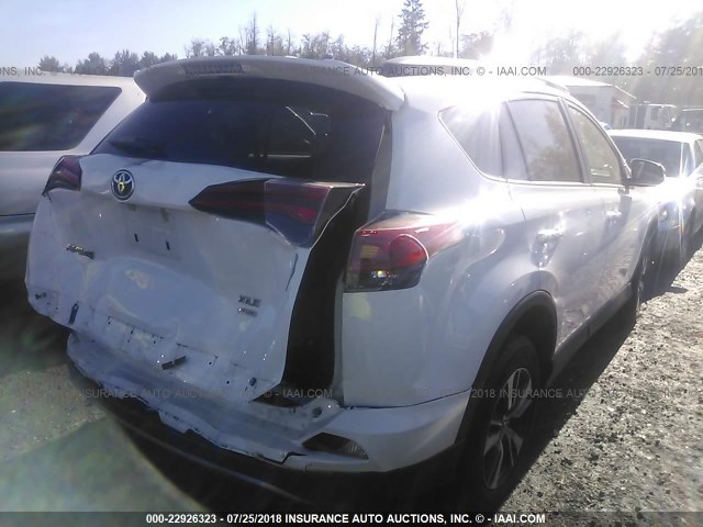 2T3RFREV0JW743835 - 2018 TOYOTA RAV4 ADVENTURE/XLE WHITE photo 4