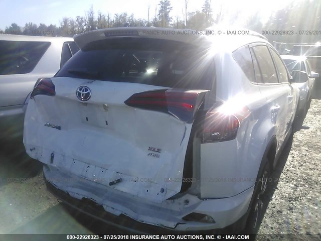 2T3RFREV0JW743835 - 2018 TOYOTA RAV4 ADVENTURE/XLE WHITE photo 6