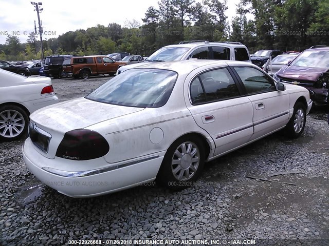 1LNHM97V51Y729459 - 2001 LINCOLN CONTINENTAL  WHITE photo 4