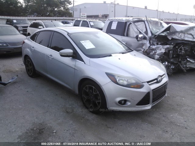 1FAHP3J25CL304482 - 2012 FORD FOCUS TITANIUM SILVER photo 1