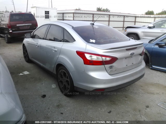 1FAHP3J25CL304482 - 2012 FORD FOCUS TITANIUM SILVER photo 3