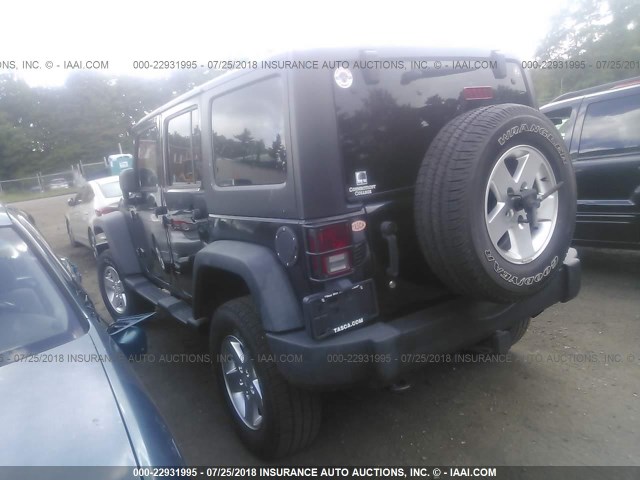 1J4BA6H16BL611412 - 2011 JEEP WRANGLER UNLIMITE RUBICON BLACK photo 3